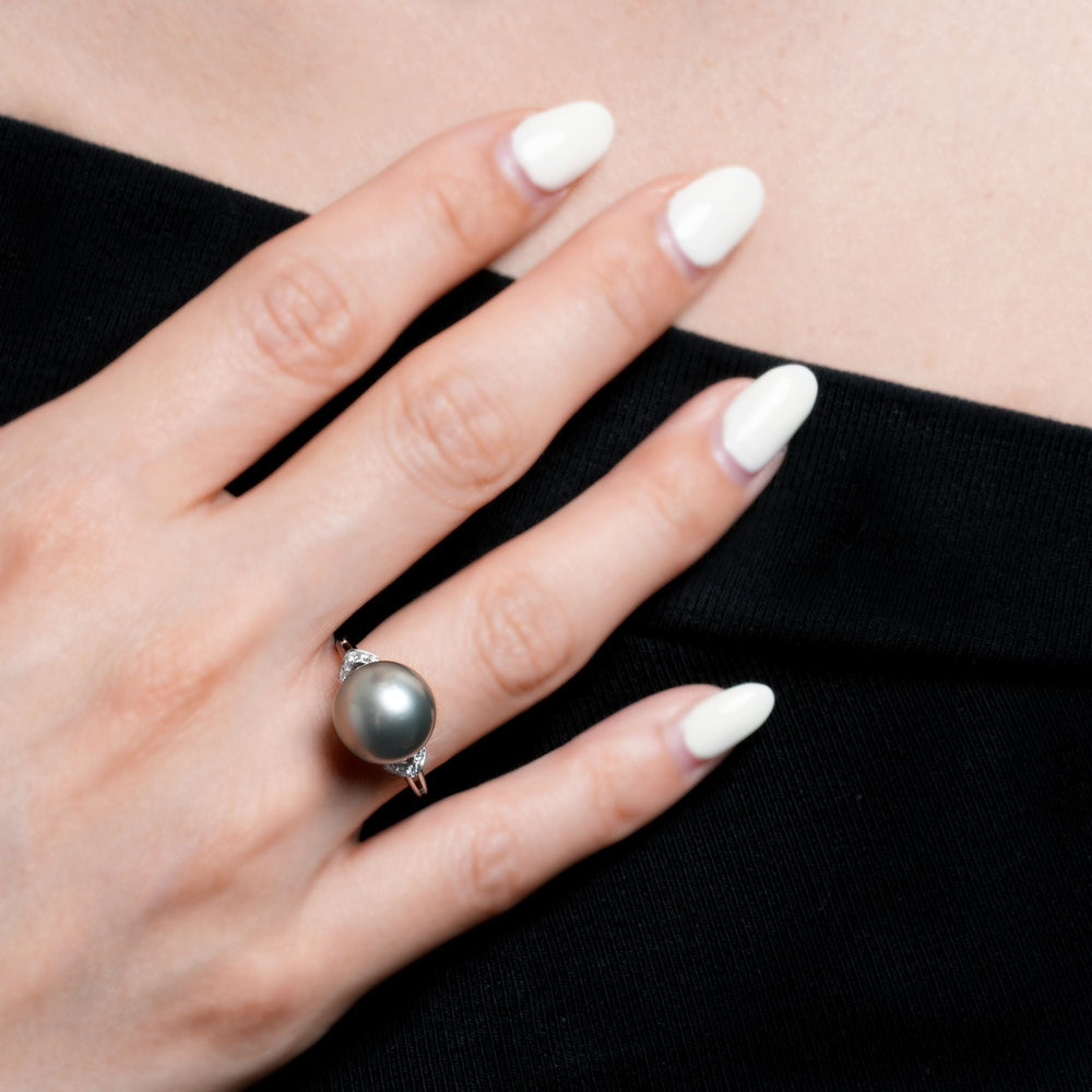 18K Gold Tahitian Pearl Ring with Sparkling Diamond Accent, Worn on a Hand